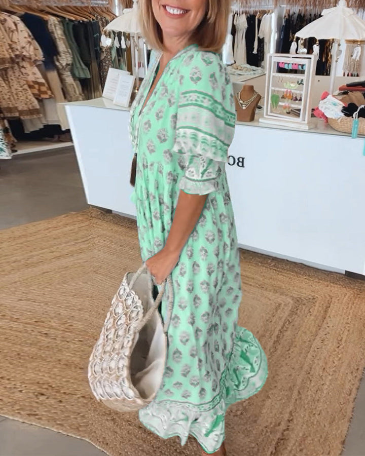 GIULIA | Gemustertes Midikleid mit V-Ausschnitt und eleganten Balloonärmeln