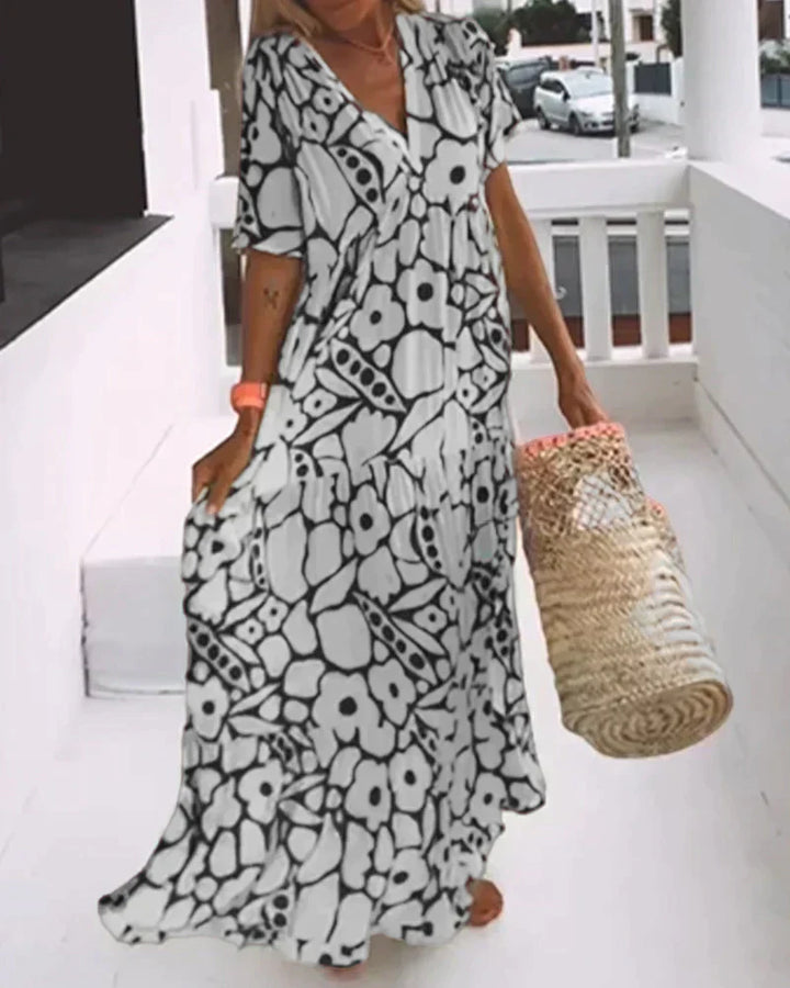 CHRISTINE | Langes Sommerkleid mit lockerem Schnitt und elegantem grafischem Muster